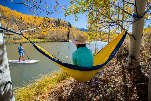 Paddle boarding near Crested Butte in fall colors